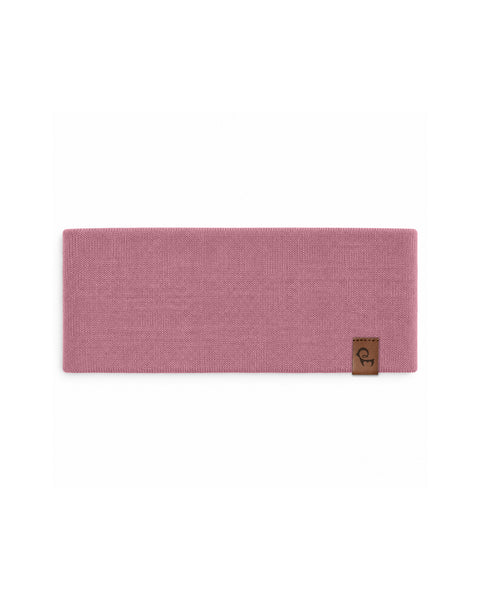 Product flat lay displaying a solid pink rectangular knit fabric headband with a small brown leather brand tag, laid flat against a white background.