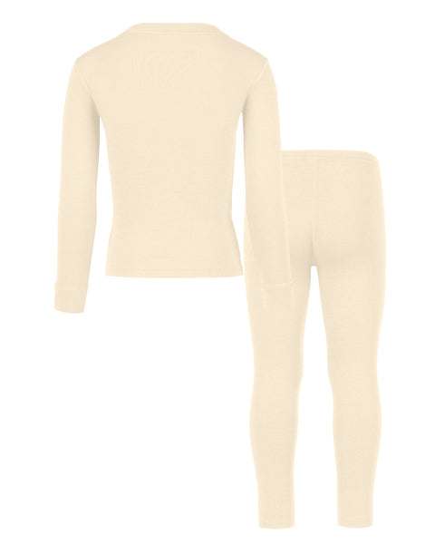 Back view of the kids' menique merino 250gsm two piece set of long sleeve top and pants, in natural color, white background.