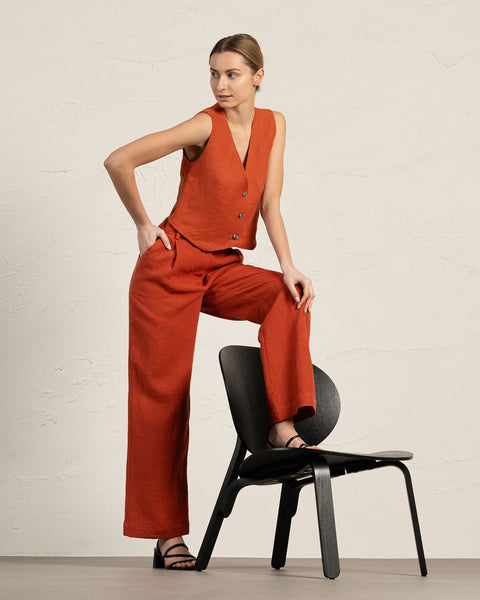 Linen vest Ava in cinnamon red color paired with Linen pleated pants Lotus in cinnamon red color