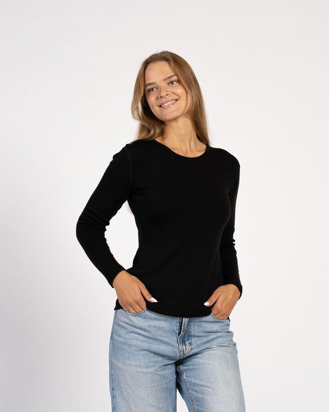 Front view of women’s long sleeve thermal shirt in black – 250 Merino wool base layer