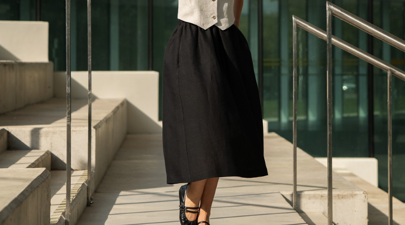 a woman wearing a black linen skirt sophia.