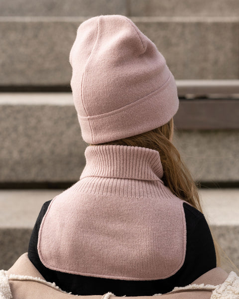 Kids Merino wool knit dickie in dusty pink worn with matching beanie, back view, winter layering accessory