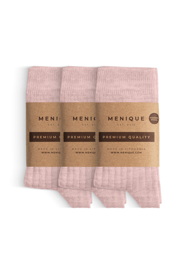 A 3-pack of kids’ pale pink ribbed merino wool socks labeled “Menique Premium Quality.