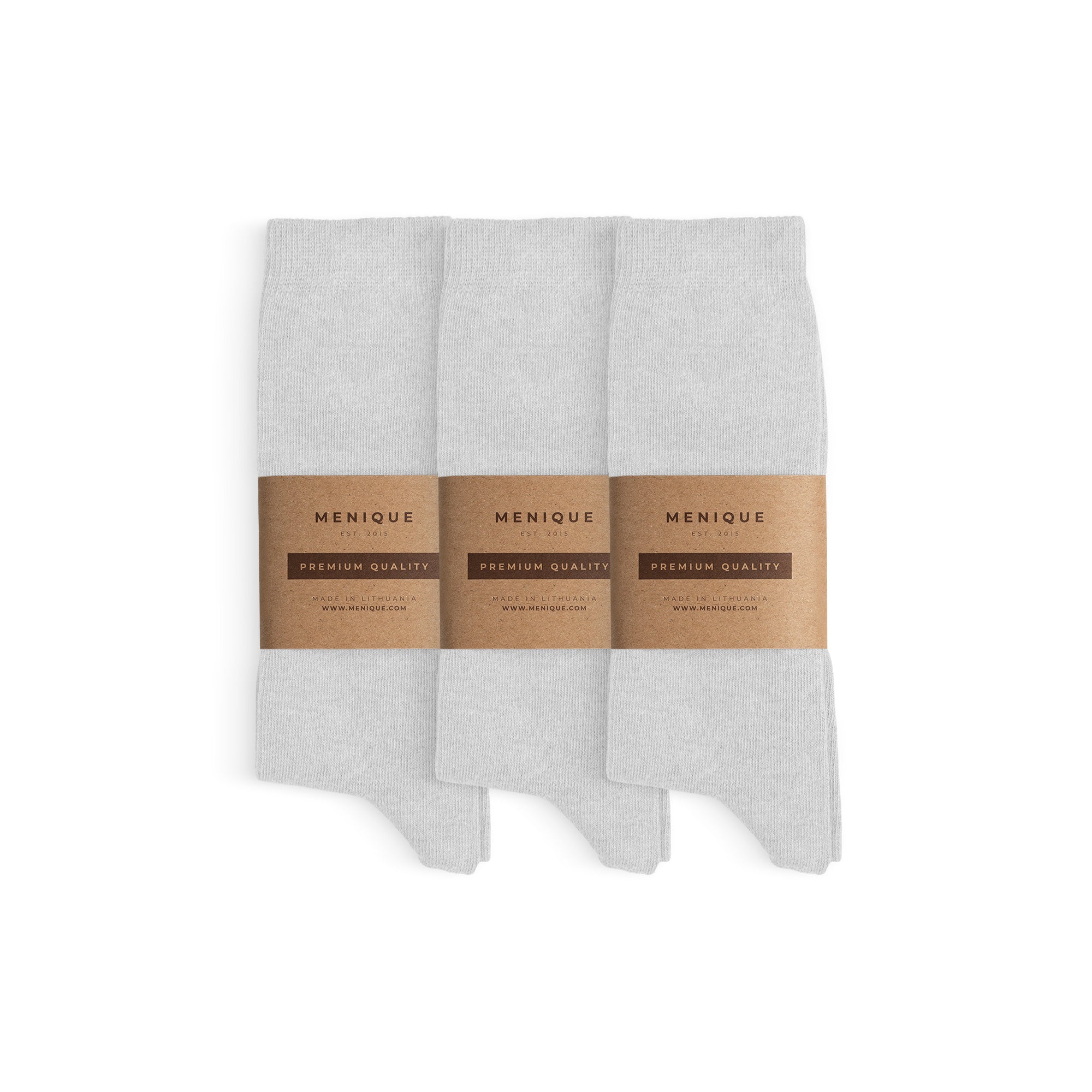 Three pairs of dark blue men’s cotton socks arranged side by side with Menique brown paper labels marked ‘Premium Quality.