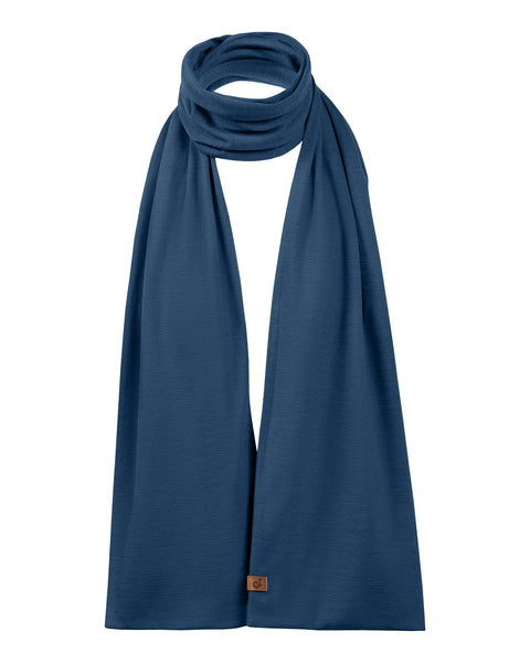 Unisex Merino wool scarf in denim blue, displayed with a simple wrap style.