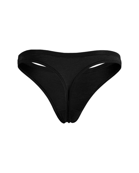 The Menique Women&#39;s Merino Thong Briefs in black color, back view.
