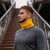 menique unisex neck gaiter in mango power (yellow) color, in a white background.